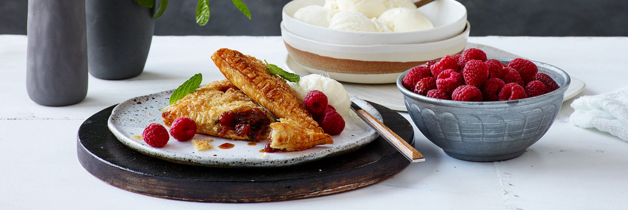 Berry pie with berries and cream