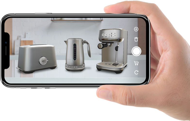 man holding phone with Breville AR app