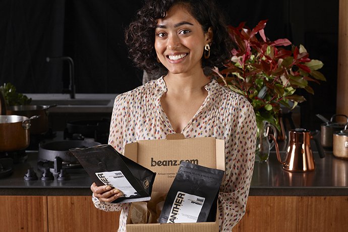 customer with package of fresh beans