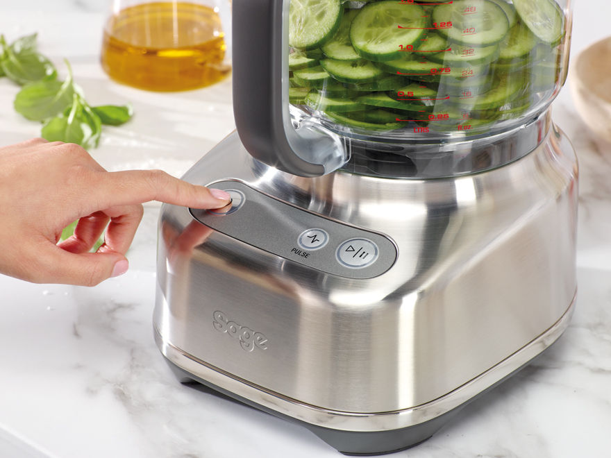 Cucumber slices in the food processor bowl