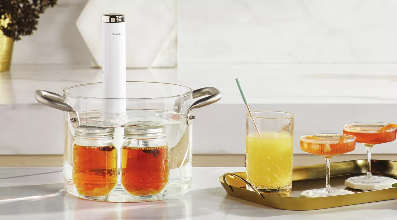 Cocktails on a tray next to the Joule Turbo Sous Vide
