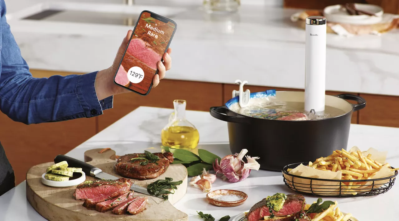 Phone screen displaying Medium Rare, food and water bath