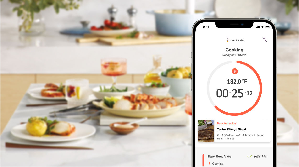 Phone displaying the Turbo function, product and couple in the background