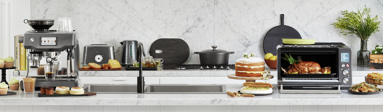 Kitchen with beautiful Sage appliances in Black Stainless Steel